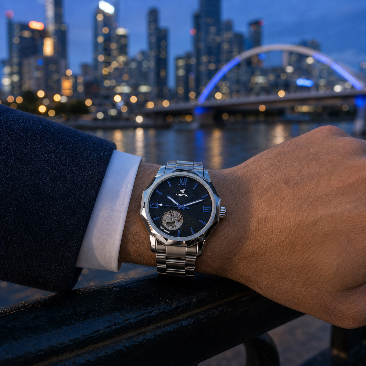 KINETIC Oceana black-dial stainless-steel watch worn beside the Yarra at Melbourne blue hour