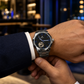 KINETIC Oceana stainless-steel watch worn with tailored navy evening clothing