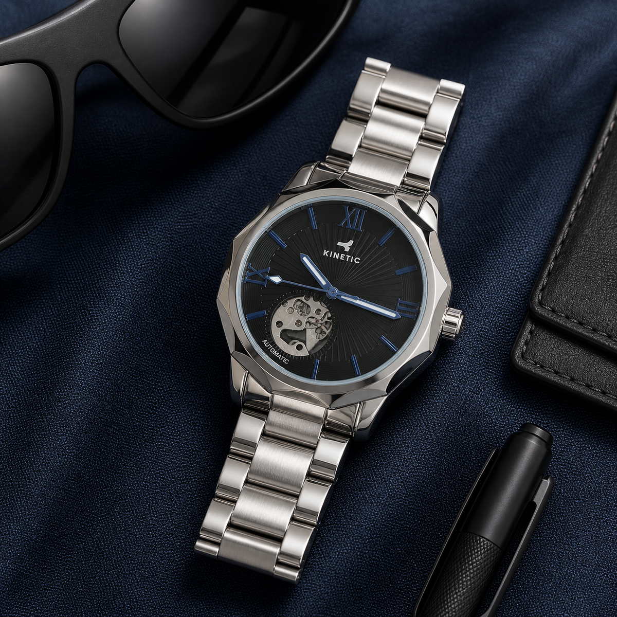 KINETIC Oceana black-dial watch in a navy editorial flat-lay