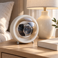 Orbit White displaying an automatic watch on a bedside table