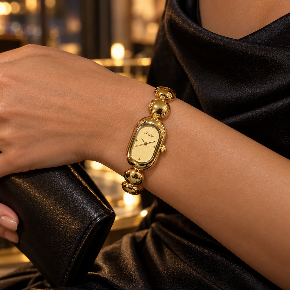 Scottie Champagne watch styled with black satin and a clutch