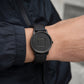 Black Kinetic Vector magnetic watch worn on wrist
